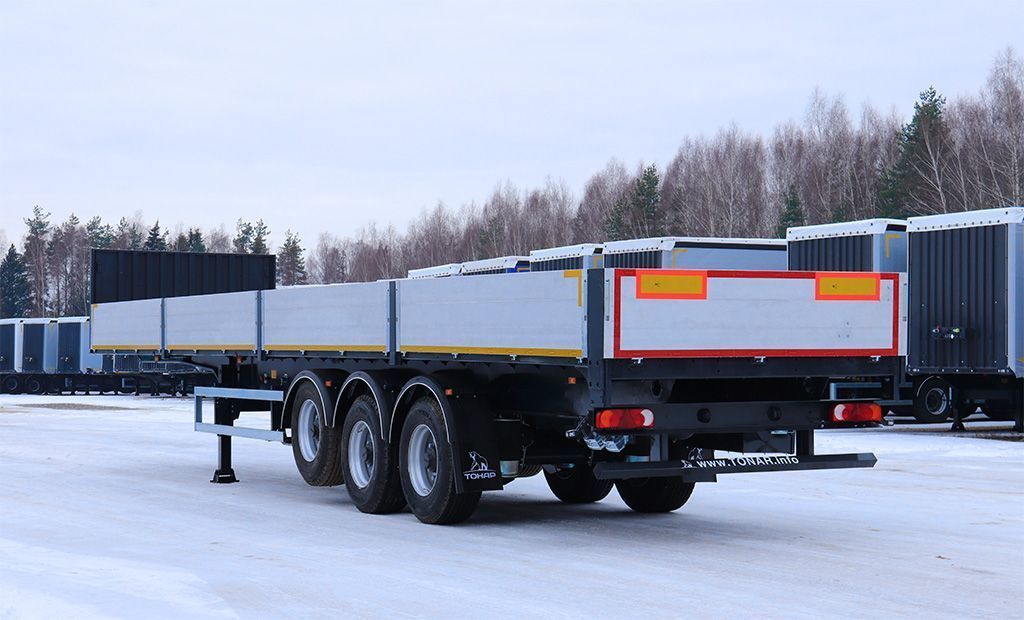 Бортовой полуприцеп Тонар B3-13/K (с кониками)